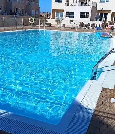 Duplex Con Piscina Climatizada. Hébergement de vacances Caleta de Fuste